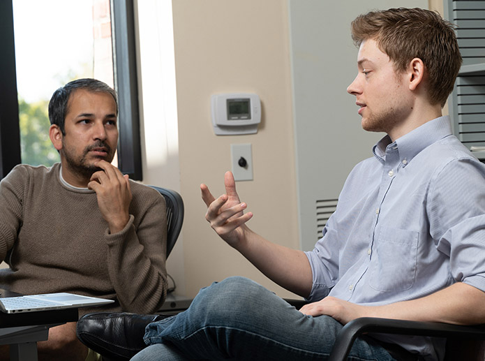 Rice University computer scientist Ashumali Shrivastava and graduate student Ben Coleman