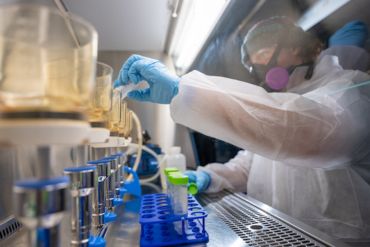 Rice research technician Russell Carlson-Stadler analyzes wastewater samples for signs of the SARS-CoV-2 virus. 
