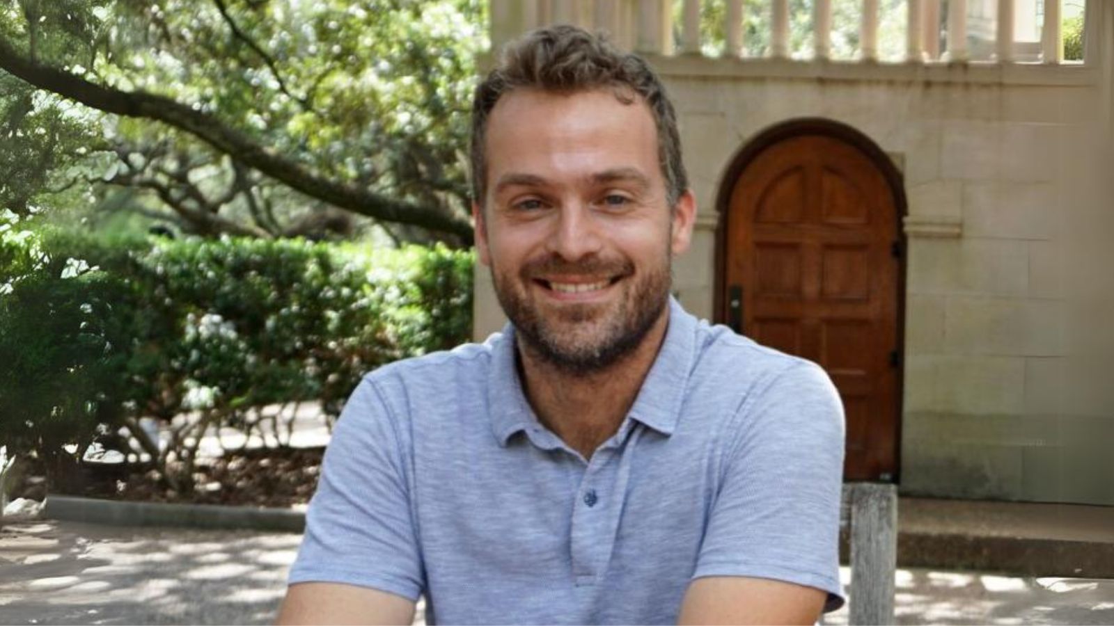 Anastasios Kyrillidis sits outside on the Rice University campus