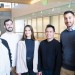 EPMP Fulbright students stand in an atrium at Rice University 